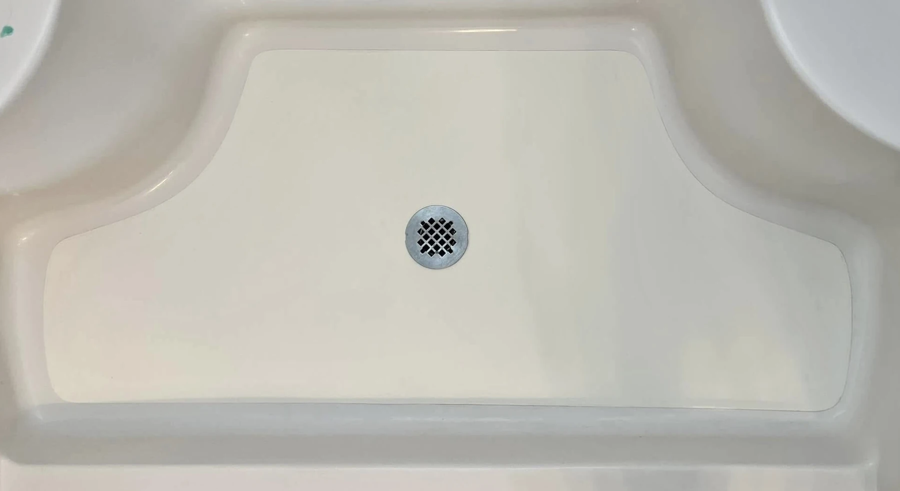 Completed custom Nu-Life shower floor inlay